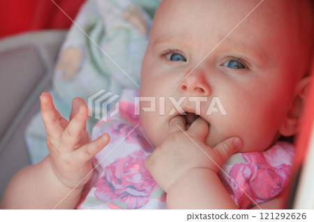Little happy baby in stroller Little happy baby in stroller 121292626