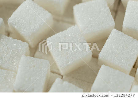 Cubes of white crystalline beetroot refined sugar. 121294277
