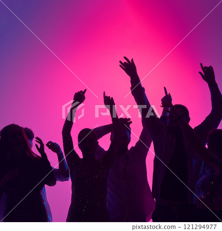 Dance floor comes alive with youthful energy, glowing lights, and crowd reveling in music, laughter, and unforgettable toasts. 121294977