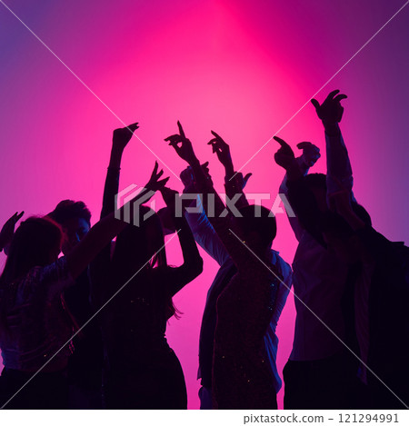 Cheers erupt as friends toast under glowing lights, energy of music fueling night filled with dancing, joy, and shared memories. Cheers erupt as friends toast under glowing lights, energy of music fueling night filled with dancing, joy, and shared memories. 121294991