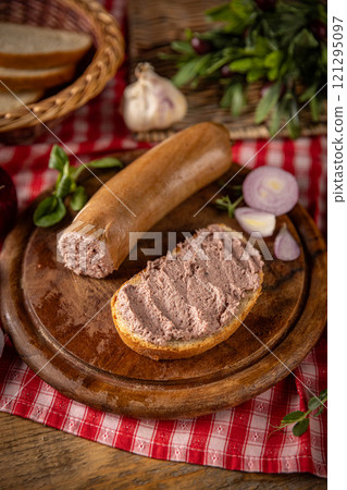 Liver sausage on bread 121295097