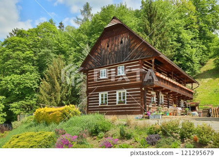 Traditional wooden cottage in Czech republic Traditional wooden cottage in Czech republic 121295679