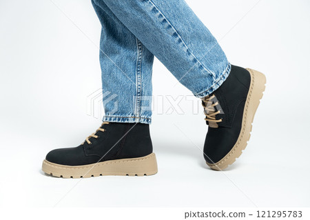 Womens boots, trendy winter shoes, isolate close-up. 121295783