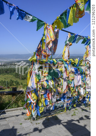 Fluttering pieces of cloth with sacred texts - 'Him Morin' - symbols of Buddhism 121296203