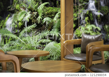 Beautiful tropical green plant and tree decorated in resort garden 121298034