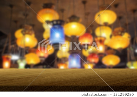 Wooden Table with Blurred Vintage Lamps Background Wooden Table with Blurred Vintage Lamps Background 121299280