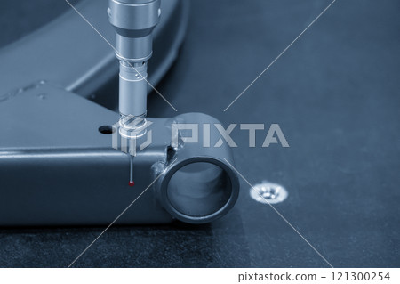 The  CMM probe measuring the  aluminum automotive parts. 121300254