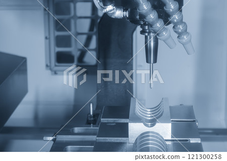 The CNC milling machine cutting mold part by solid ball end mill tool. The CNC milling machine cutting mold part by solid ball end mill tool. 121300258