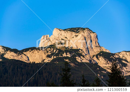 Path to the Angerstein mountain summit, Alps, Gosau, Gmunden district, Upper Austria federal state, sunny summer day, clear blue sky Path to the Angerstein mountain summit, Alps, Gosau, Gmunden district, Upper Austria federal state, sunny summer day, clear blue sky 121300559