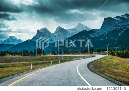 Scenic road trip with rocky mountains over winding road in national park at Canada Scenic road trip with rocky mountains over winding road in national park at Canada 121302140