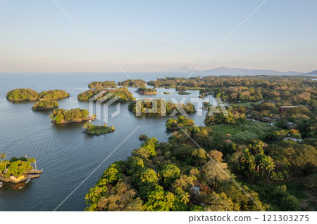 Many islands on sunset light 121303275