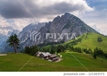 Donnerkogel Mountain in Alps, Gosau, Gmunden district, Upper Austria federal state, sunny summer day Donnerkogel Mountain in Alps, Gosau, Gmunden district, Upper Austria federal state, sunny summer day 121303573