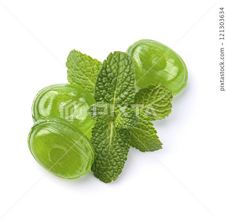 Mint candy with mint herbal on white backgrounds Mint candy with mint herbal on white backgrounds 121303634