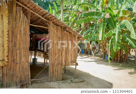 Bamboo hut in a village on a small island in the Philippines. Bamboo hut in a village on a small island in the Philippines. 121304401