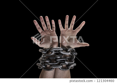 Two hands in chains isolated on black background with clipping path 121304460
