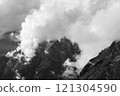 Black and white photo of clouds building on a mountain in Triglav National Park 121304590
