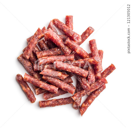 Smoked kabanos. Mini dried thin sausages isolated on white background Smoked kabanos. Mini dried thin sausages isolated on white background 121305012