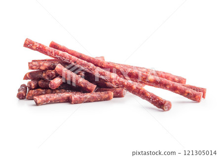 Smoked kabanos. Mini dried thin sausages isolated on white background 121305014