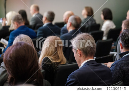 Audience attentively listening to speaker in business seminar 121306345