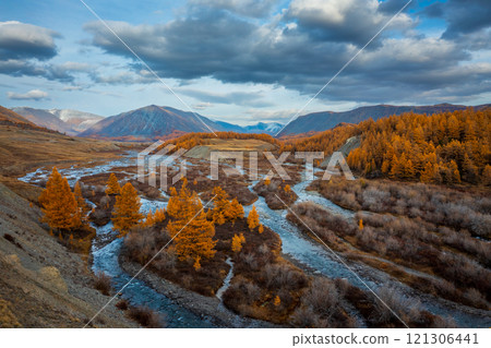 Autumn Landscape with River Flowing Through Remote Altai Mountains Autumn Landscape with River Flowing Through Remote Altai Mountains 121306441