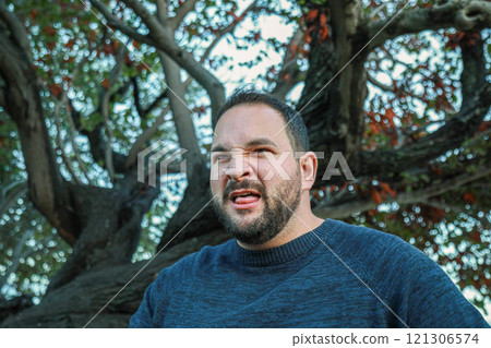 Man After A Bite Of A Sour Lemon Man After A Bite Of A Sour Lemon 121306574