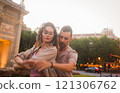 Couple dancing swing in madrid near puerta de alcala at sunset 121306762