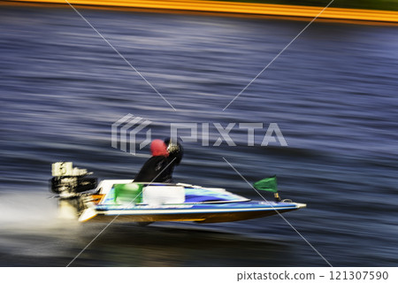Speeding boat 121307590