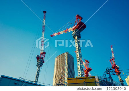 Tokyo High-rise apartment building and tower crane under construction 2024.11 c-3 Warm and cool colors Tokyo High-rise apartment building and tower crane under construction 2024.11 c-3 Warm and cool colors 121308040