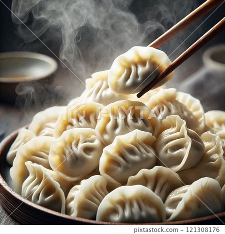 A mountain of piping hot boiled dumplings 121308176