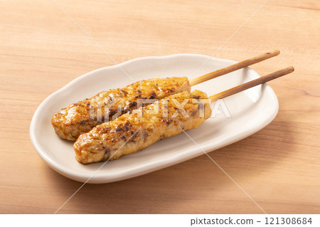 Beef tongue meatball skewers 121308684