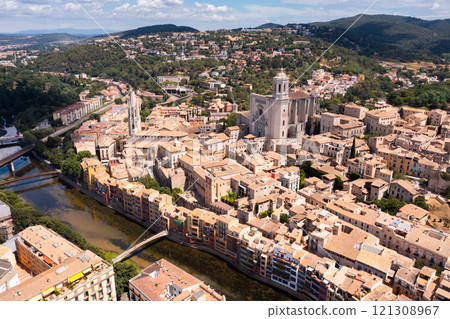 Aerial view of Girona on river Onyar with Cathedral and Collegiate Church Aerial view of Girona on river Onyar with Cathedral and Collegiate Church 121308967