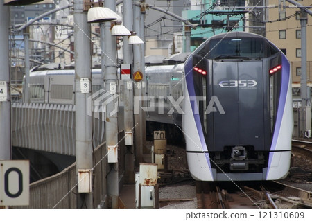 Azusa Express departing Tokyo Station in the afternoon: E353 series train Azusa Express departing Tokyo Station in the afternoon: E353 series train 121310609