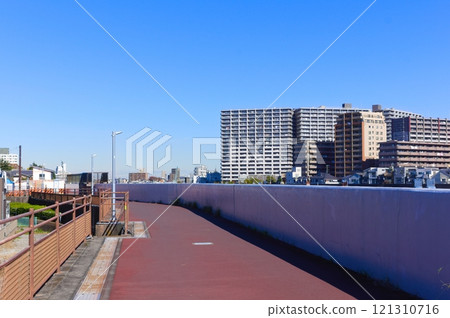 Road along the old Edogawa River in Edogawa Ward, Tokyo December 2024 Road along the old Edogawa River in Edogawa Ward, Tokyo December 2024 121310716