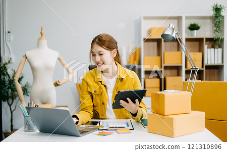 Fashion blogger concept, Young Asian women selling clothes on video streaming.Startup small business SME 121310896