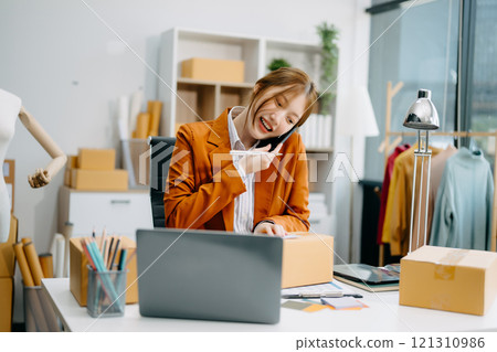 Fashion blogger concept, Young Asian women selling clothes on video streaming.Startup small business SME Fashion blogger concept, Young Asian women selling clothes on video streaming.Startup small business SME 121310986