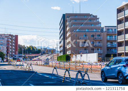 The south exit of Toyota Station on a sunny day - A view of the main street developing through redevelopment 121311758