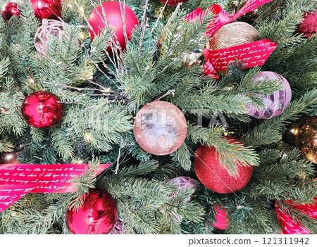 red christmas tree with decorations red christmas tree with decorations 121311942