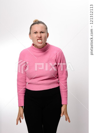 Woman expressing anger and frustration on white background. Woman expressing anger and frustration on white background. 121312113