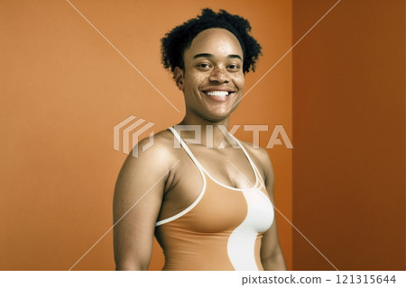 Portrait of smiling non-binary person on bright background created with ai generative tools. 121315644