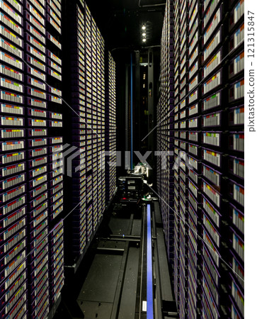 Data center with multiple rows of fully operational server racks Data center with multiple rows of fully operational server racks 121315847