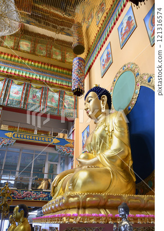Gilded Buddha statue in the Dugan Building at Rinpoche Bagsha Datsan Gilded Buddha statue in the Dugan Building at Rinpoche Bagsha Datsan 121316574