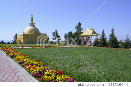 Buddhist architecture building of Datsane Rinpoche Bagsha, canopy with bell and lawn with flowers Buddhist architecture building of Datsane Rinpoche Bagsha, canopy with bell and lawn with flowers 121316644