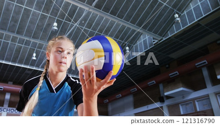 Determined player playing volleyball in the court 4k Determined player playing volleyball in the court 4k 121316790