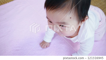 Asian baby crawling on blanket in high quality 4k format 121316945