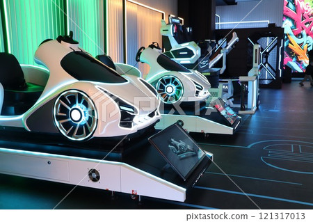 Futuristic Racing Arcade Machines Engaged in Action within a HighTech and Advanced Environment Futuristic Racing Arcade Machines Engaged in Action within a HighTech and Advanced Environment 121317013