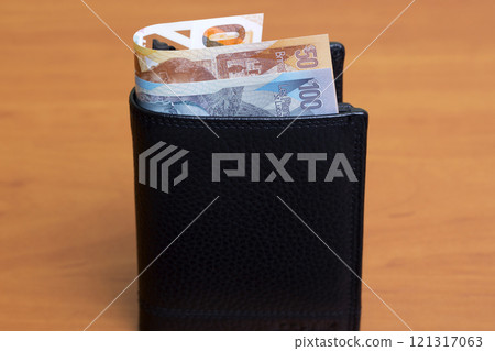 Eastern Caribbean dollar in the black wallet Eastern Caribbean dollar in the black wallet 121317063