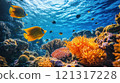 Vibrant coral reef teeming with colorful fish in a sunlit ocean. 121317228