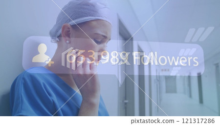 Image of followers growing number over caucasian female doctor using tablet 121317286