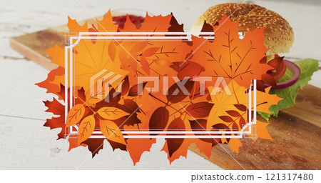 Image of frame with fall leaves over hamburger Image of frame with fall leaves over hamburger 121317480