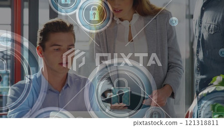 Image of icons and data processing over diverse business people in office Image of icons and data processing over diverse business people in office 121318811